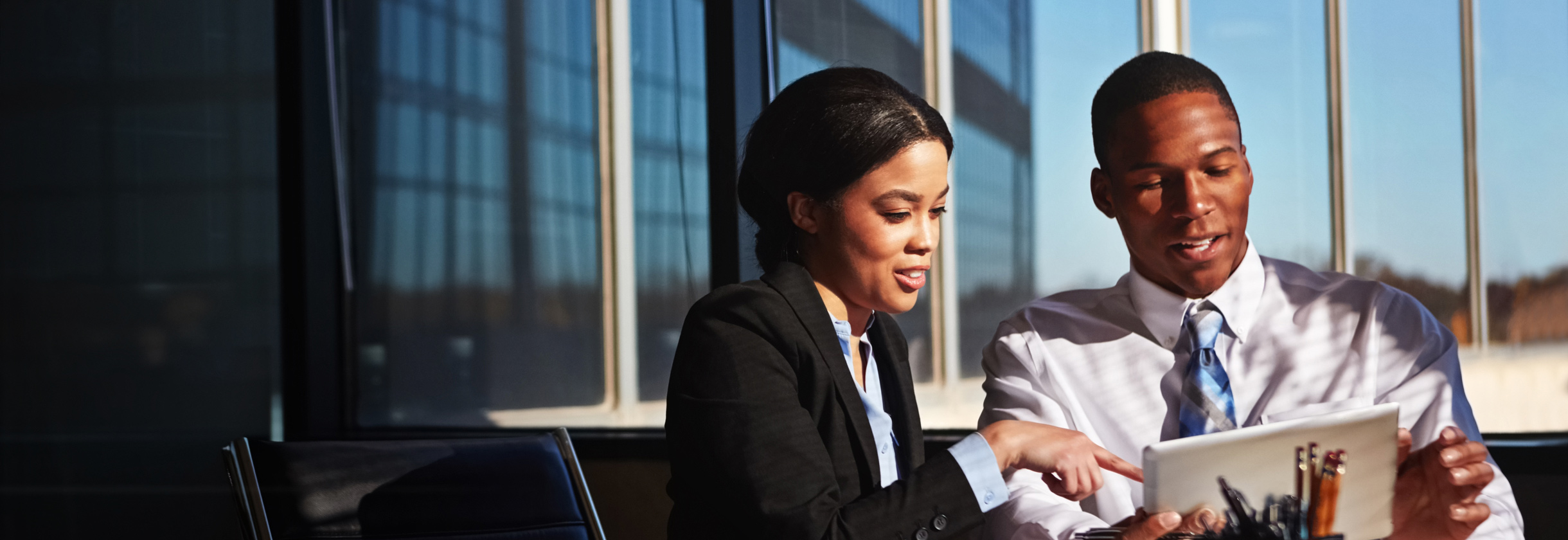 Two business owners using commercial banking solutions
